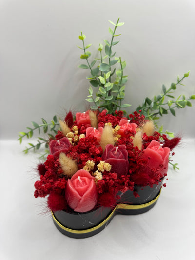 Dekorativer Kerzenblumenstrauß